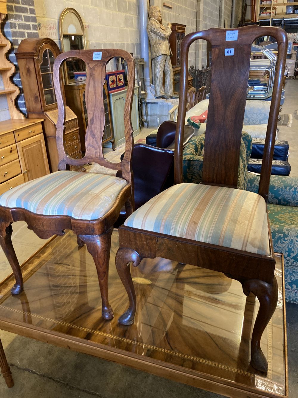 Two early 18th century walnut dining chairs